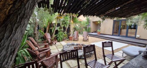 Parklands Villa | Out of Africa - 5 Bedroom indoor outdoor living with 2 firepits and sunroom