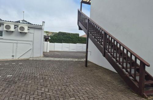 Nahoon Apartment | Deck Room with Neighborhood view