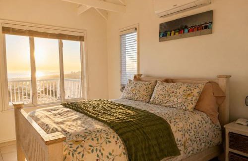 Mountainside House | 'The Bolussi Beachhouse', sleeps 12 in 6 en-suite bedrooms with Indoor Pool