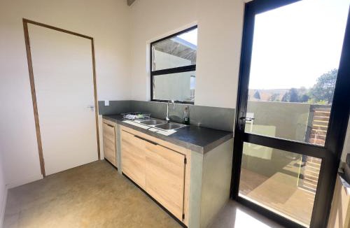 Dullstroom Villa | Waterfall Villa Stone Hot Tub Trout Estate