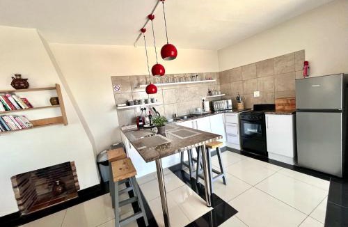 Mountainside Apartment | Seaview Sunset Boutique Apartments Gordonsbay Solar powered